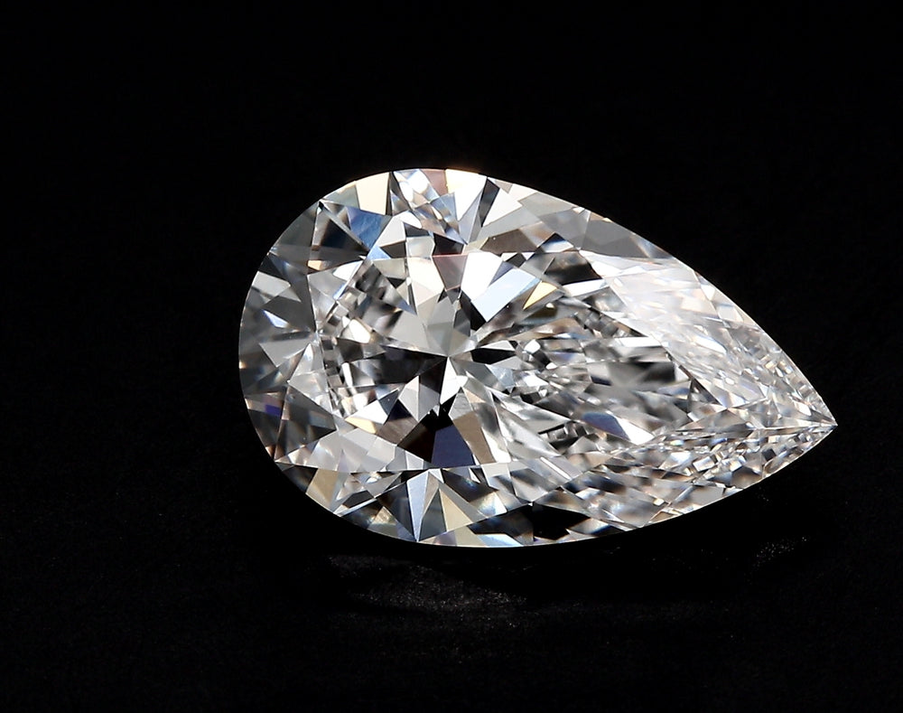 2.8 Carat Pear Lab Diamond with  Cut Diamond in 14KT  view 1
