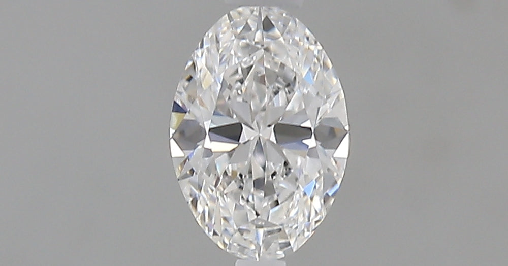 0.51 Carat Oval Natural Diamond with  Cut Diamond in 14KT  view 1
