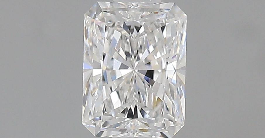 0.7 Carat Radiant Natural Diamond with  Cut Diamond in 14KT  view 1
