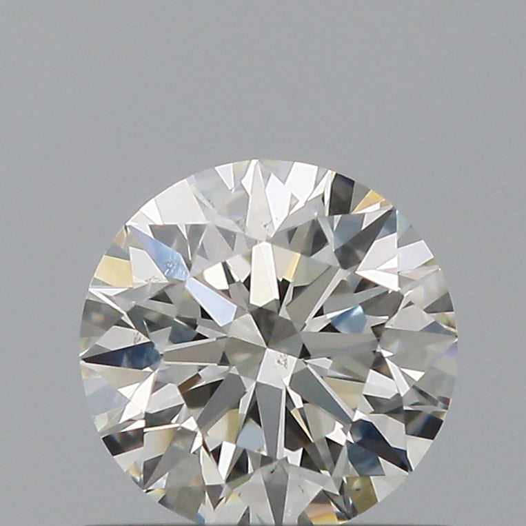 0.6 Carat Round Natural Diamond with  Cut Diamond in 14KT  view 1
