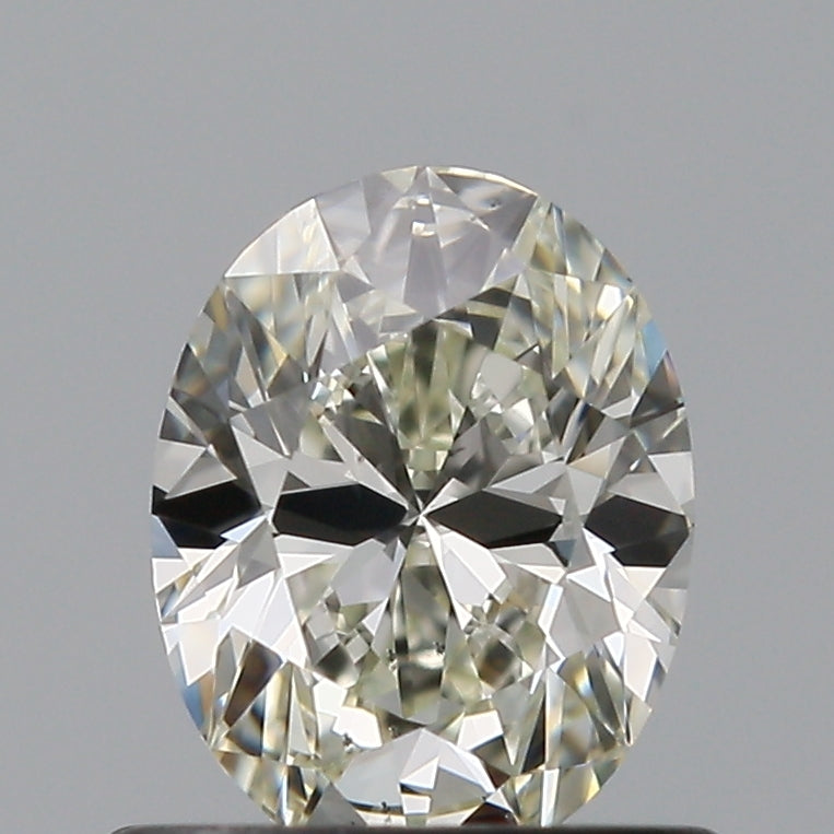 0.61 Carat Oval Natural Diamond with  Cut Diamond in 14KT  view 1
