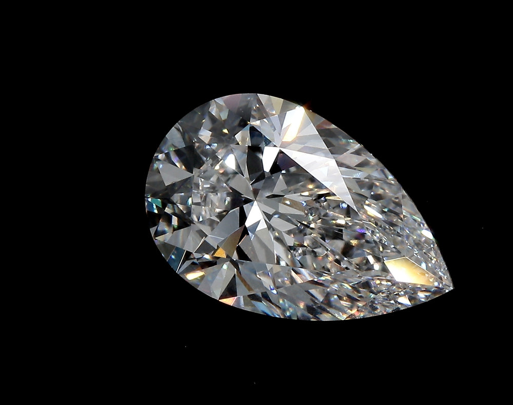 2.75 Carat Pear Lab Diamond with  Cut Diamond in 14KT  view 1
