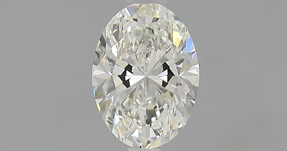 0.7 Carat Oval Natural Diamond with  Cut Diamond in 14KT  view 1
