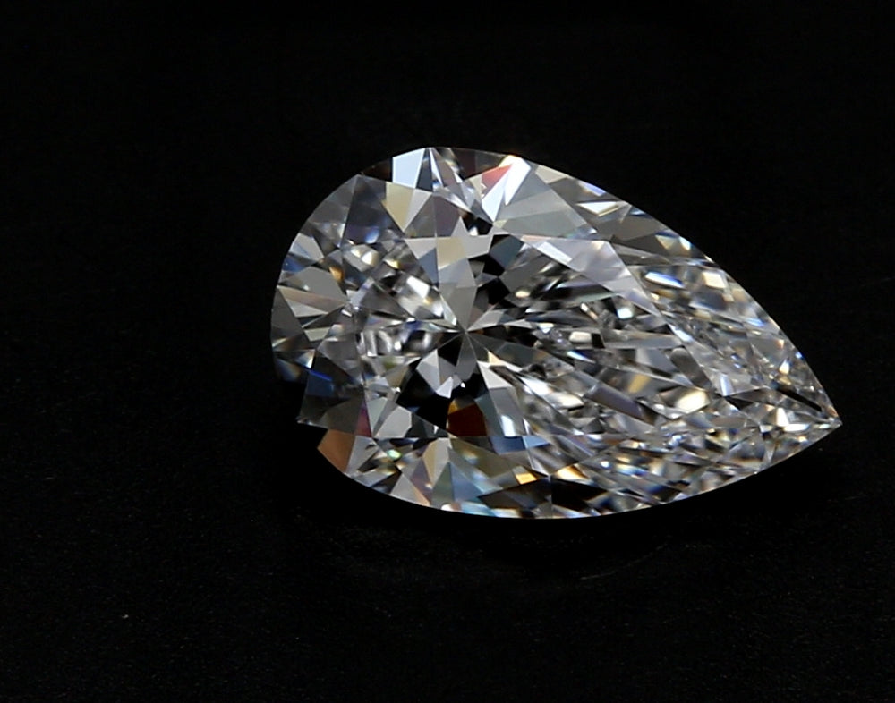 4.08 Carat Pear Lab Diamond with  Cut Diamond in 14KT  view 1
