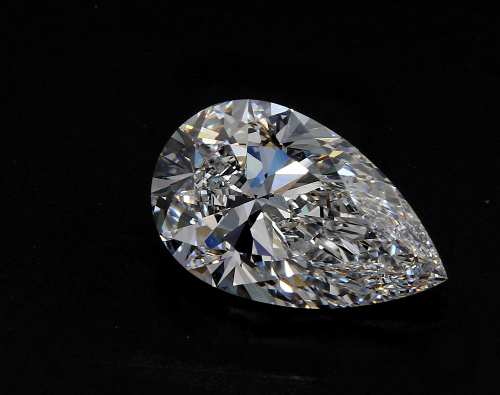 2.94 Carat Pear Lab Diamond with  Cut Diamond in 14KT  view 1
