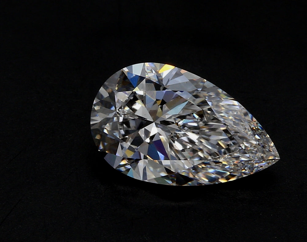 3.09 Carat Pear Lab Diamond with  Cut Diamond in 14KT  view 1
