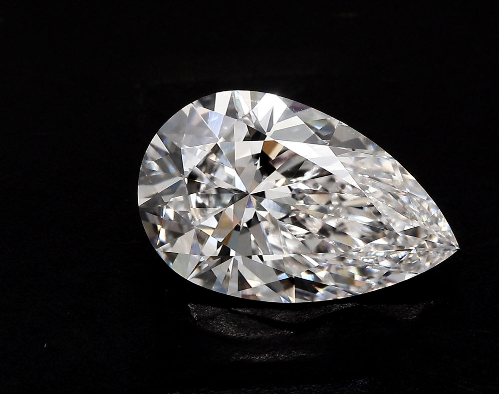 4.06 Carat Pear Lab Diamond with  Cut Diamond in 14KT  view 1

