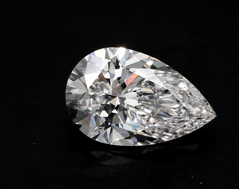 2.51 Carat Pear Lab Diamond with  Cut Diamond in 14KT  view 1
