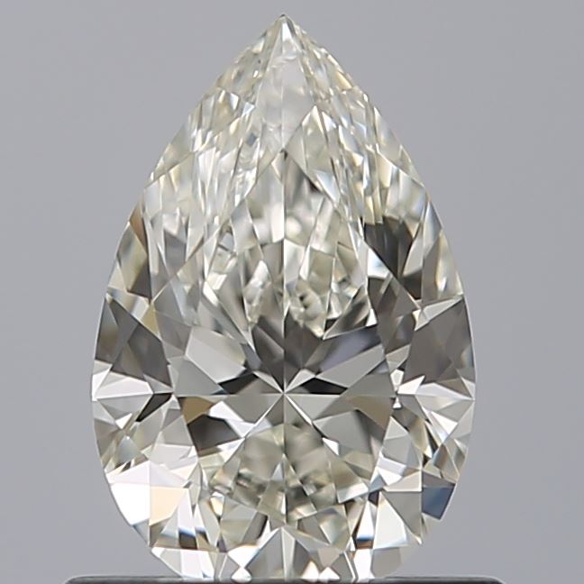 0.63 Carat Pear Natural Diamond with  Cut Diamond in 14KT  view 1
