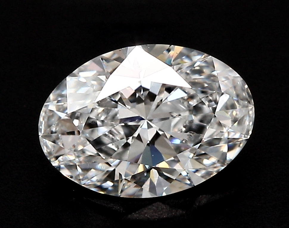 0.91 Carat Oval Lab Diamond with  Cut Diamond in 14KT  view 1
