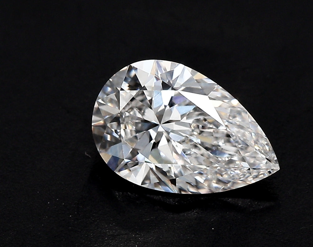 3.21 Carat Pear Lab Diamond with  Cut Diamond in 14KT  view 1
