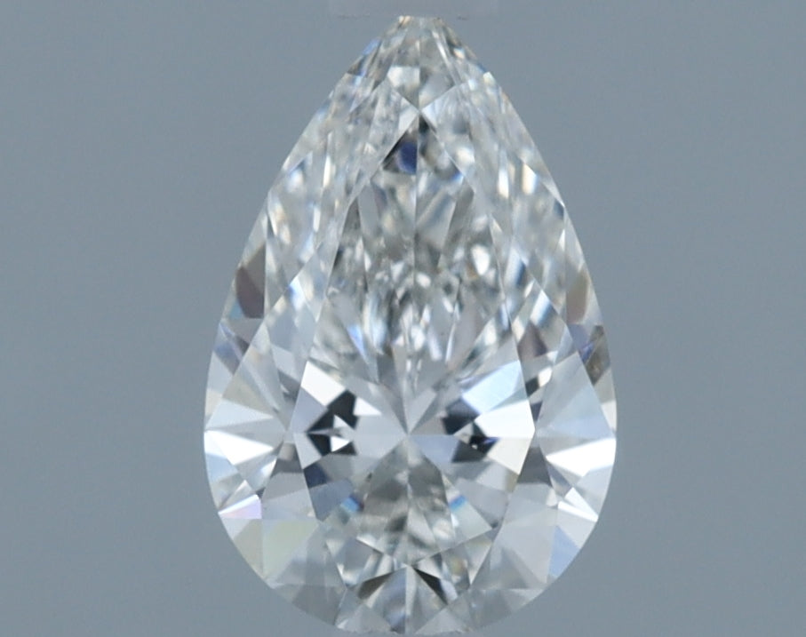 0.74 Carat Pear Lab Diamond with  Cut Diamond in 14KT  view 1

