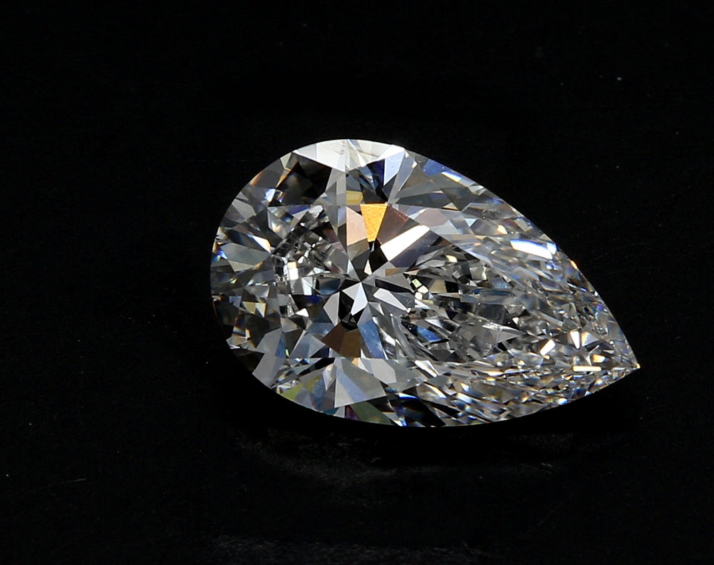 3.75 Carat Pear Lab Diamond with  Cut Diamond in 14KT  view 1
