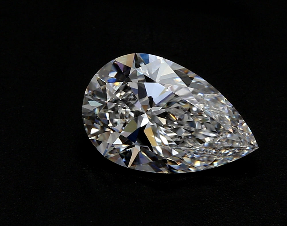 3.12 Carat Pear Lab Diamond with  Cut Diamond in 14KT  view 1
