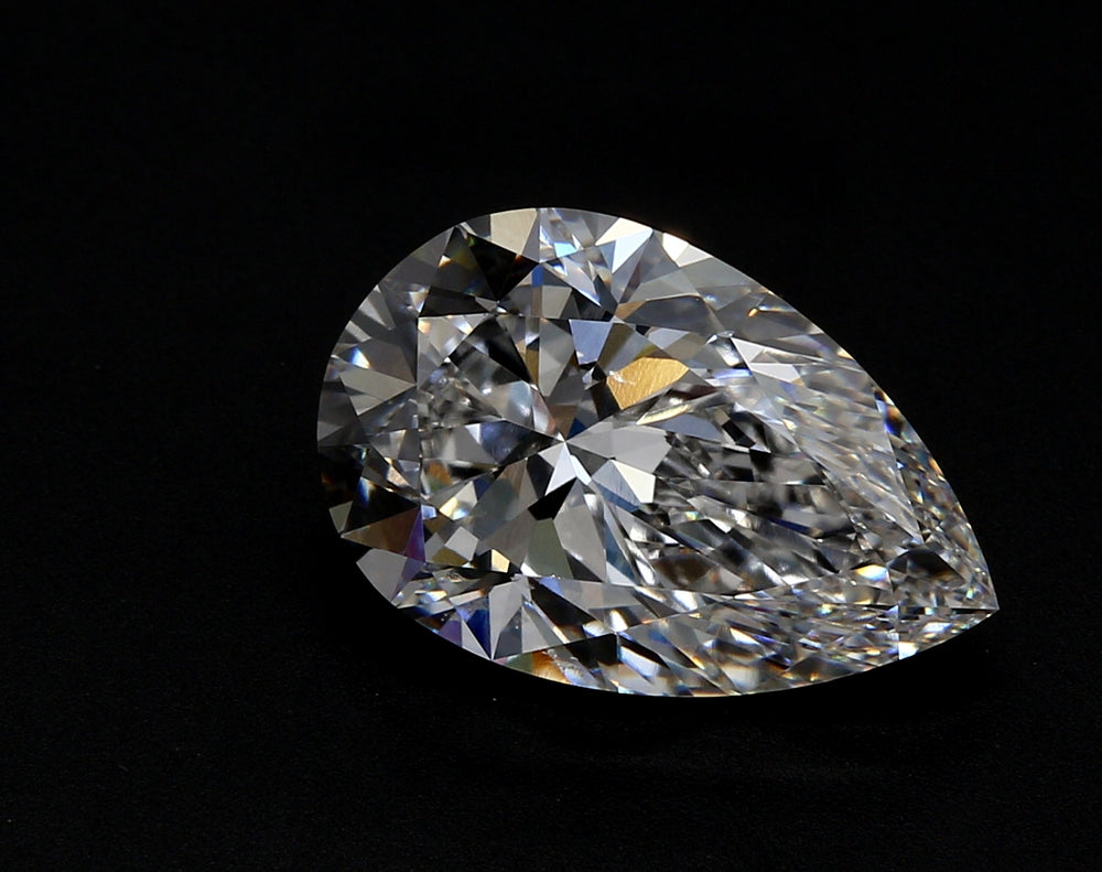 7.07 Carat Pear Lab Diamond with  Cut Diamond in 14KT  view 1
