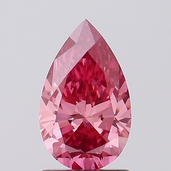 1.26 Carat Pear Lab Diamond with  Cut Diamond in 14KT  view 1
