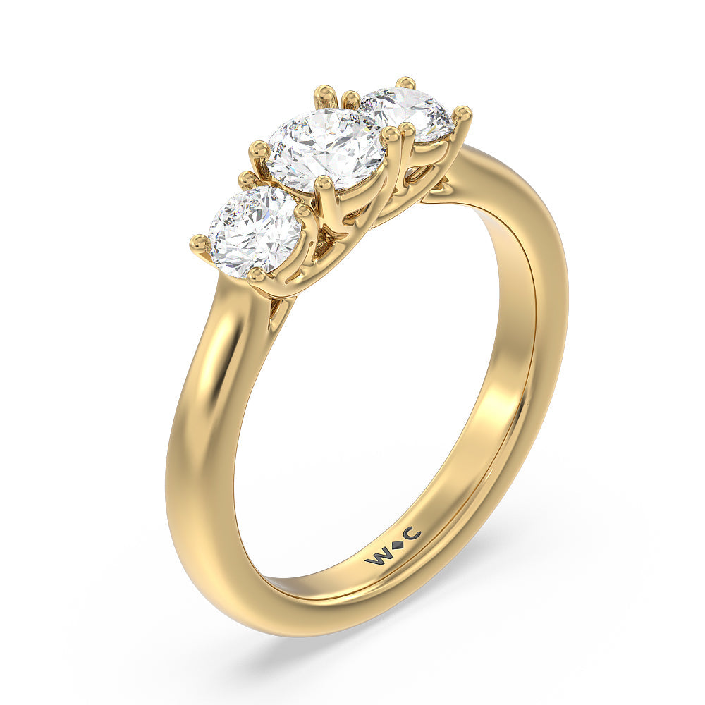 Three Stone Round Brilliant Cut Diamond Ring (F/G SI+) with 18KT Yellow Gold / Natural / 1 Cut Diamond in 14KT Yellow Gold / Natural / 1 view 5
