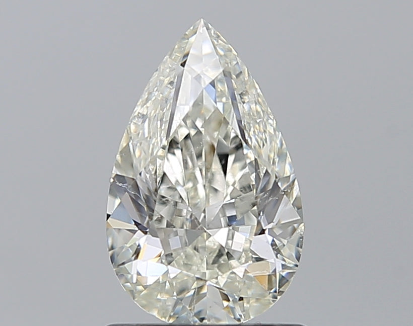1.01 Carat Pear Natural Diamond with  Cut Diamond in 14KT  view 1
