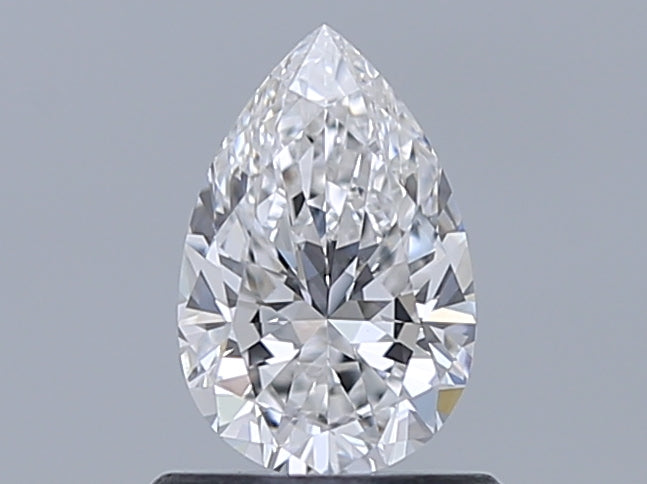 0.7 Carat Pear Natural Diamond with  Cut Diamond in 14KT  view 1
