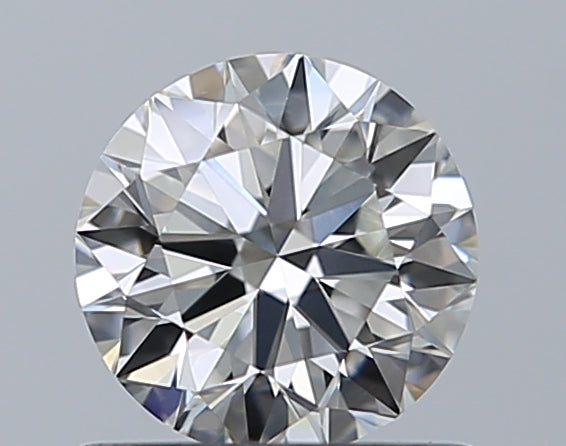 0.7 Carat Round Natural Diamond with  Cut Diamond in 14KT  view 1
