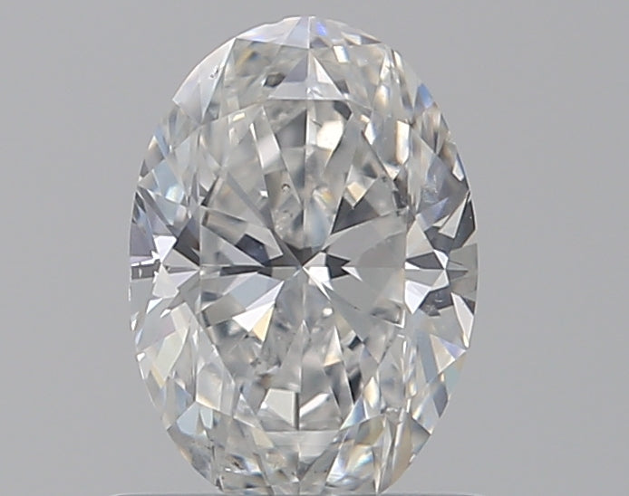 0.72 Carat Oval Natural Diamond with  Cut Diamond in 14KT  view 1
