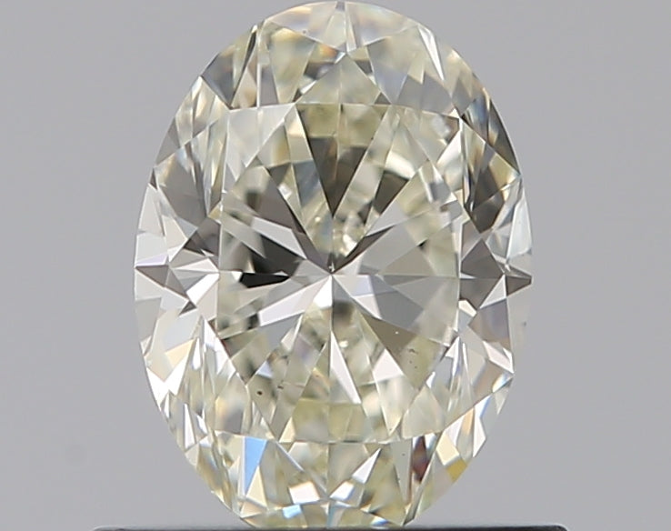 0.69 Carat Oval Natural Diamond with  Cut Diamond in 14KT  view 1
