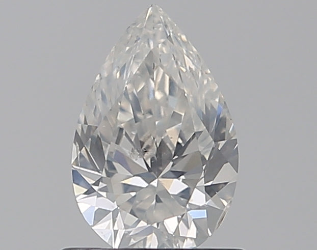 0.63 Carat Pear Natural Diamond with  Cut Diamond in 14KT  view 1
