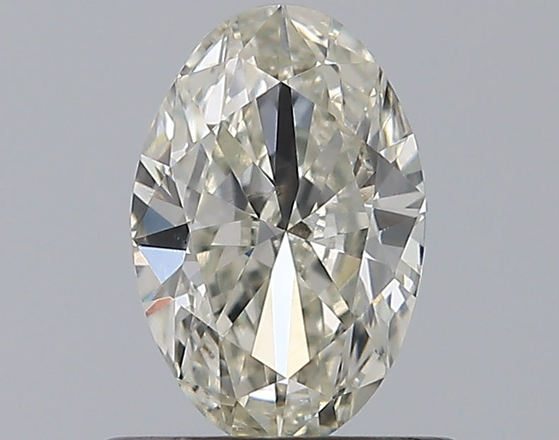 0.54 Carat Oval Natural Diamond with  Cut Diamond in 14KT  view 1
