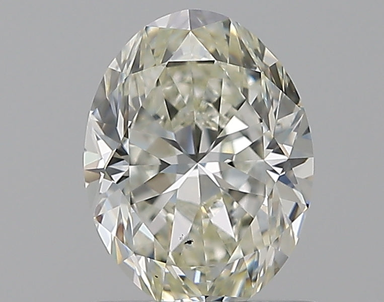 0.9 Carat Oval Natural Diamond with  Cut Diamond in 14KT  view 1
