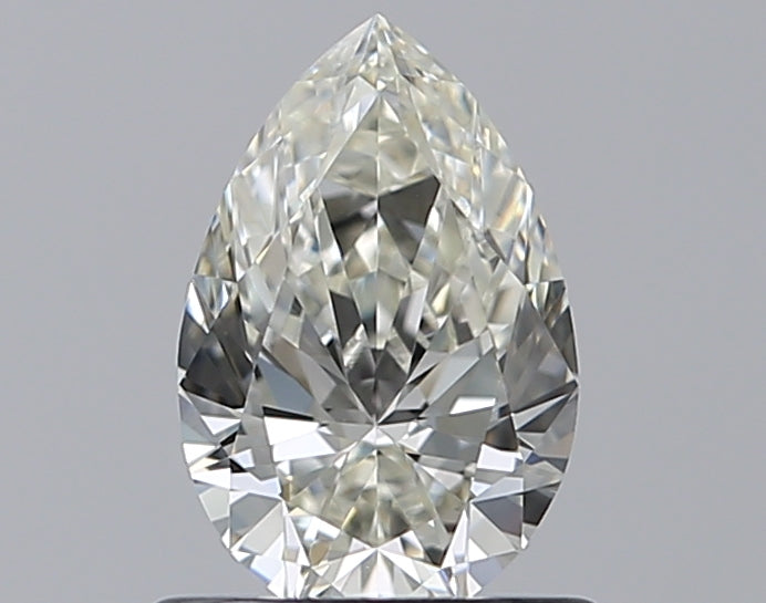 0.65 Carat Pear Natural Diamond with  Cut Diamond in 14KT  view 1
