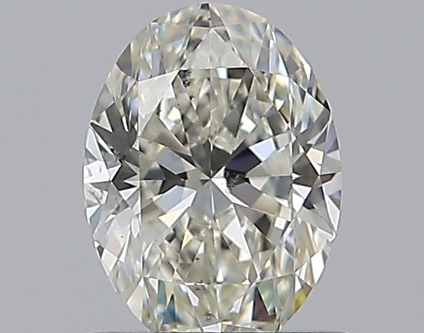 0.8 Carat Oval Natural Diamond with  Cut Diamond in 14KT  view 1
