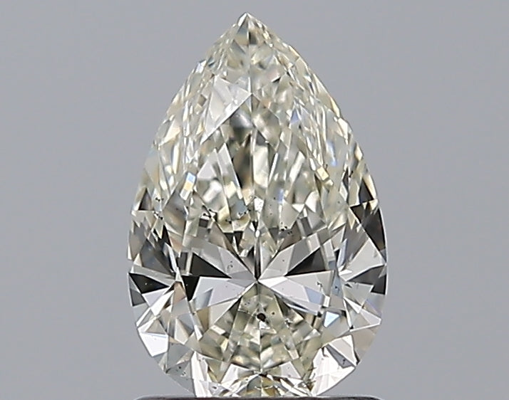 1.01 Carat Pear Natural Diamond with  Cut Diamond in 14KT  view 1
