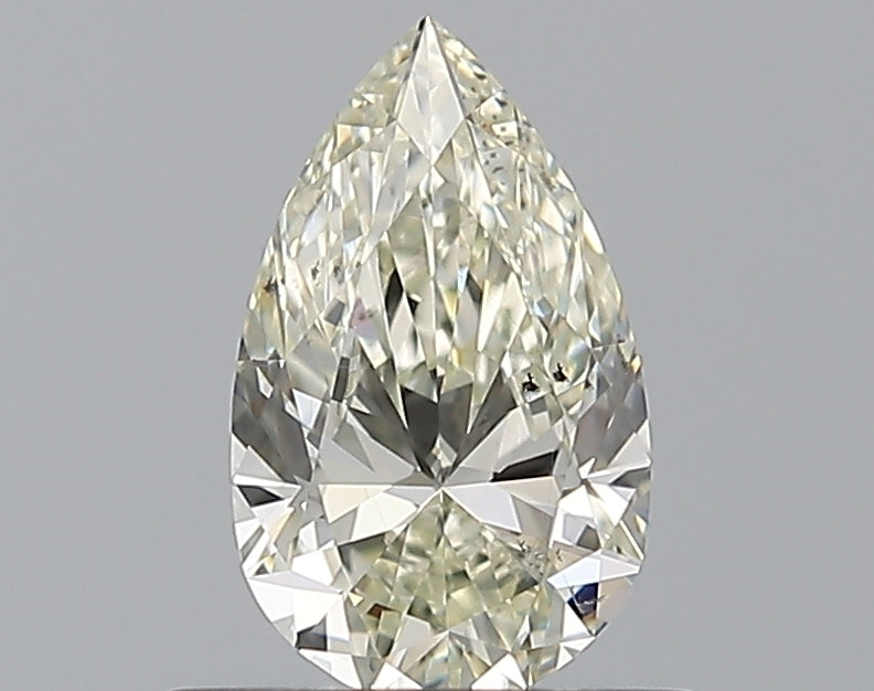0.6 Carat Pear Natural Diamond with  Cut Diamond in 14KT  view 1
