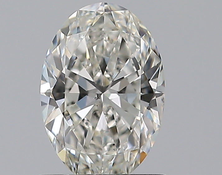 0.8 Carat Oval Natural Diamond with  Cut Diamond in 14KT  view 1
