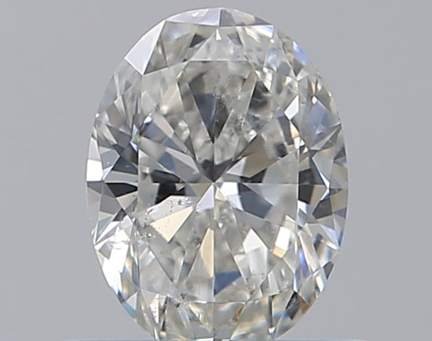 0.5 Carat Oval Natural Diamond with  Cut Diamond in 14KT  view 1

