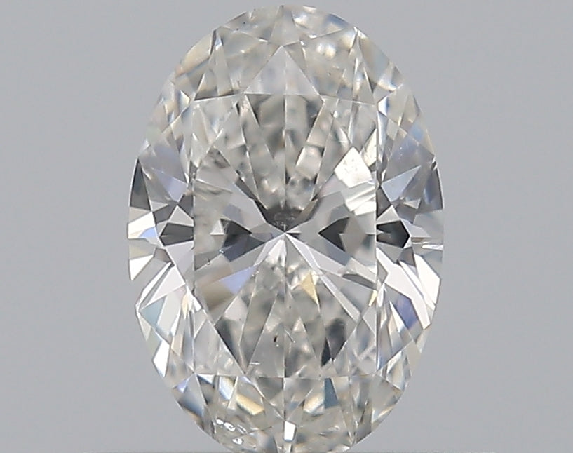 0.5 Carat Oval Natural Diamond with  Cut Diamond in 14KT  view 1
