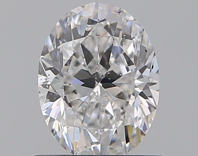 0.8 Carat Oval Natural Diamond with  Cut Diamond in 14KT  view 1
