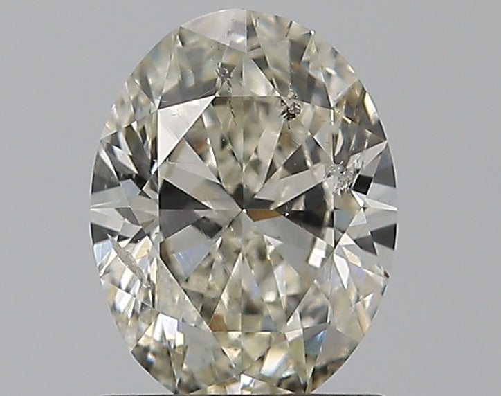 0.96 Carat Oval Natural Diamond with  Cut Diamond in 14KT  view 1
