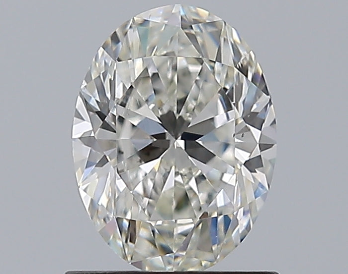 0.99 Carat Oval Natural Diamond with  Cut Diamond in 14KT  view 1
