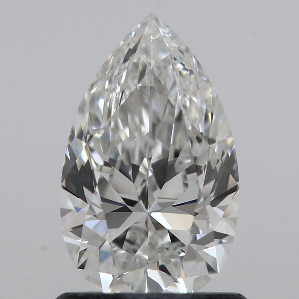 1.05 Carat Pear Natural Diamond with  Cut Diamond in 14KT  view 1
