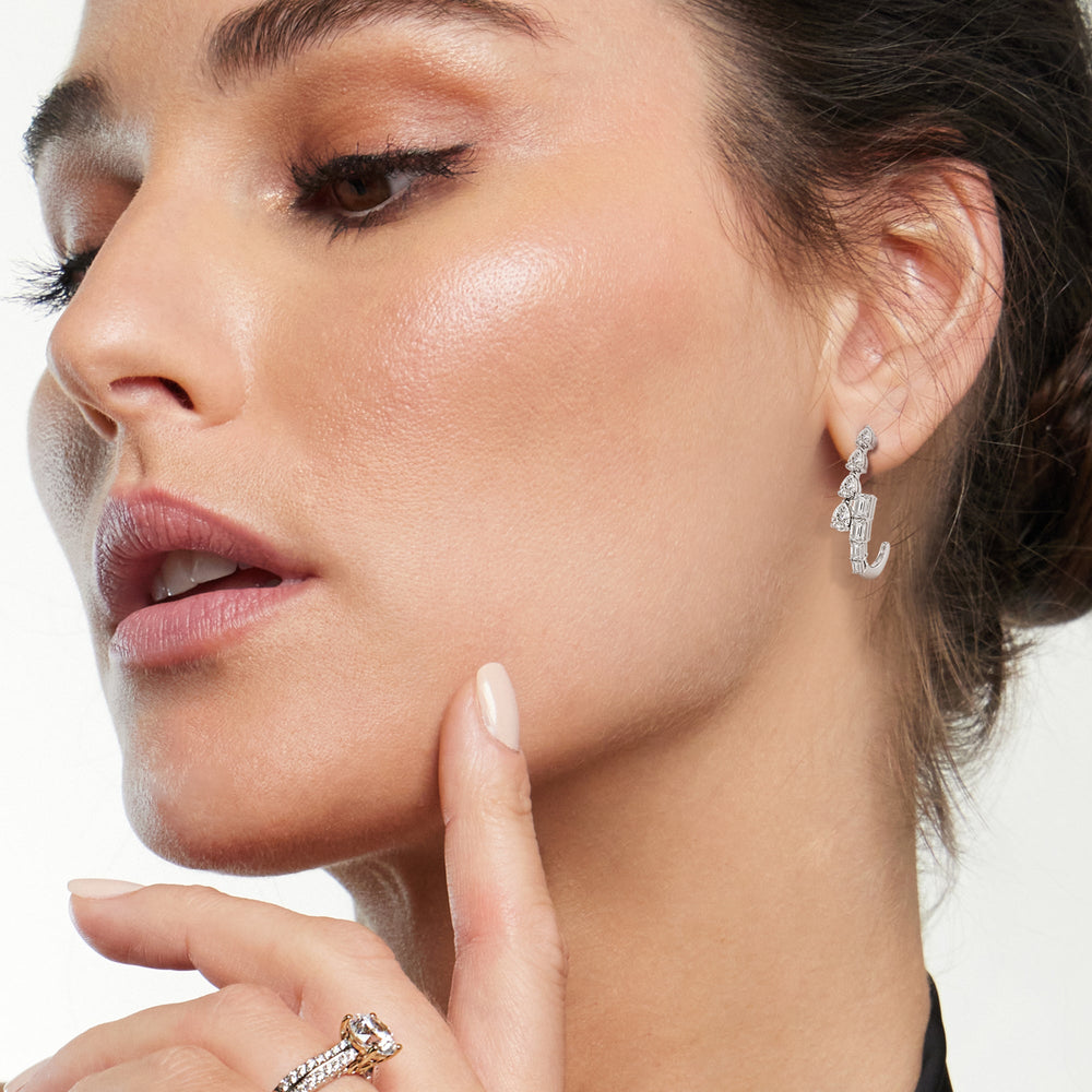 Model Wearing Graduating Emerald & Pear Earrings view