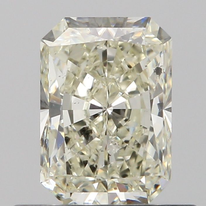 0.52 Carat Radiant Natural Diamond with  Cut Diamond in 14KT  view 1
