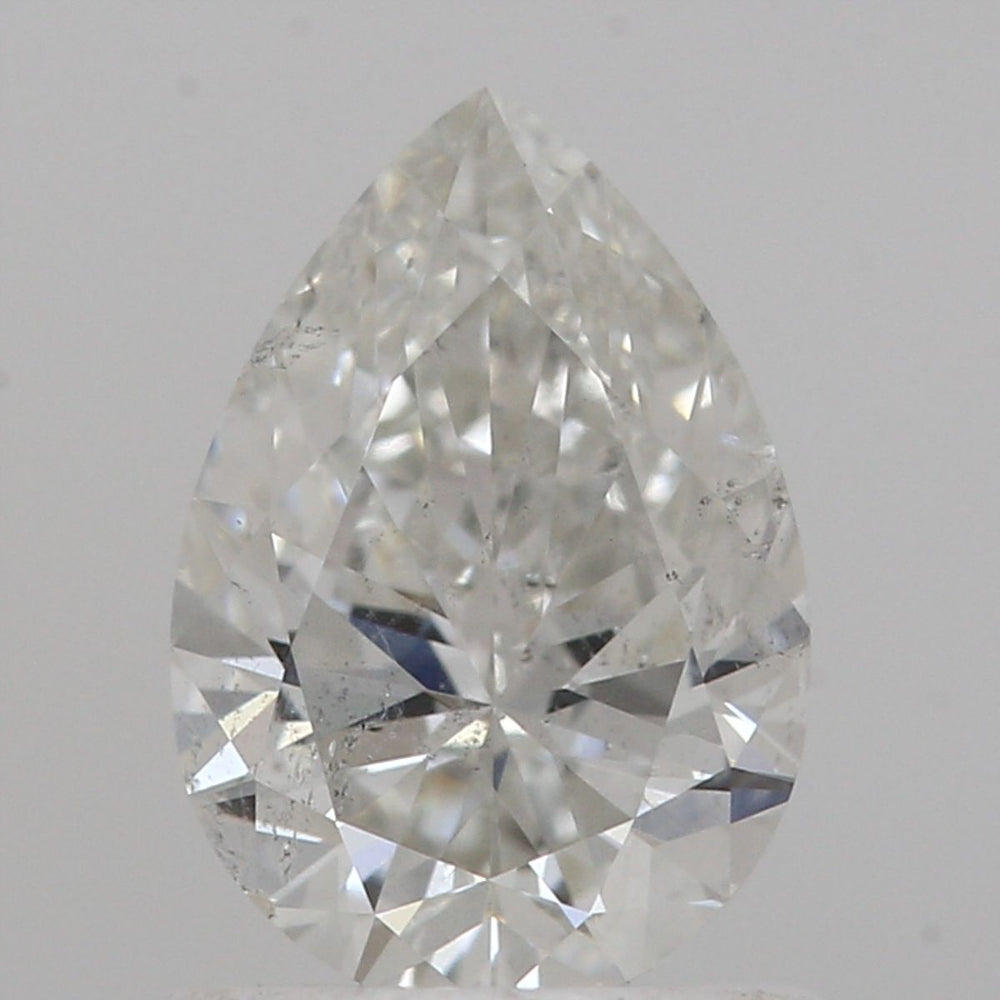 0.9 Carat Pear Natural Diamond with  Cut Diamond in 14KT  view 1

