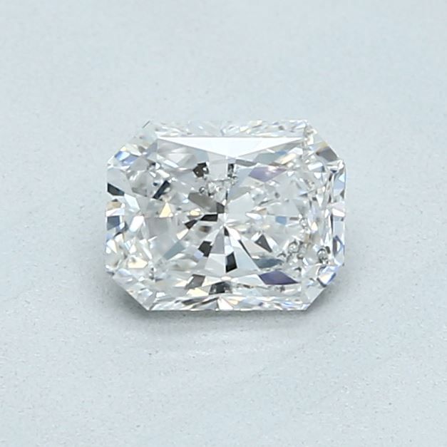 0.6 Carat Radiant Natural Diamond with  Cut Diamond in 14KT  view 1
