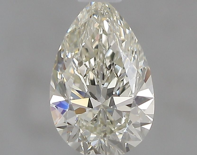 0.41 Carat Pear Natural Diamond with  Cut Diamond in 14KT  view 1
