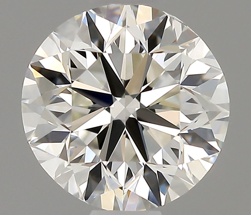0.7 Carat Round Natural Diamond with  Cut Diamond in 14KT  view 1
