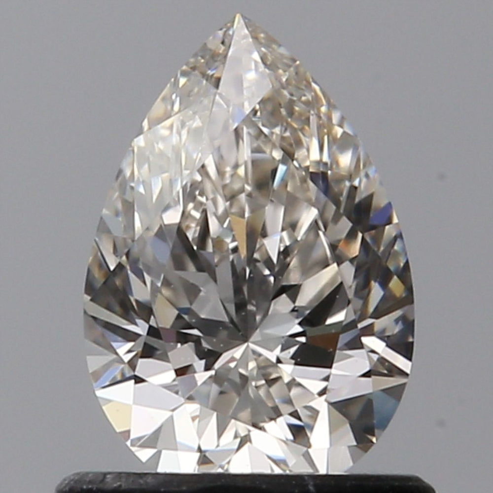 0.71 Carat Pear Natural Diamond with  Cut Diamond in 14KT  view 1

