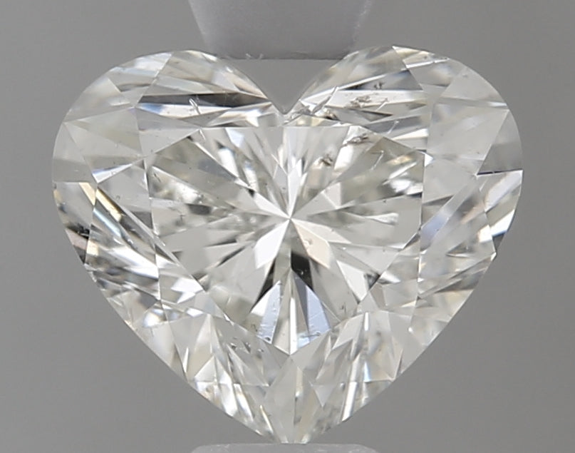 0.76 Carat Heart Natural Diamond with  Cut Diamond in 14KT  view 1
