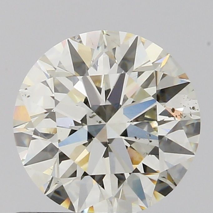 0.9 Carat Round Natural Diamond with  Cut Diamond in 14KT  view 1
