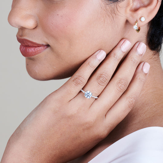 Model Wearing 1 3/4 cttw Round Cut Under Bezeled Accent Diamond Engagement Ring view
